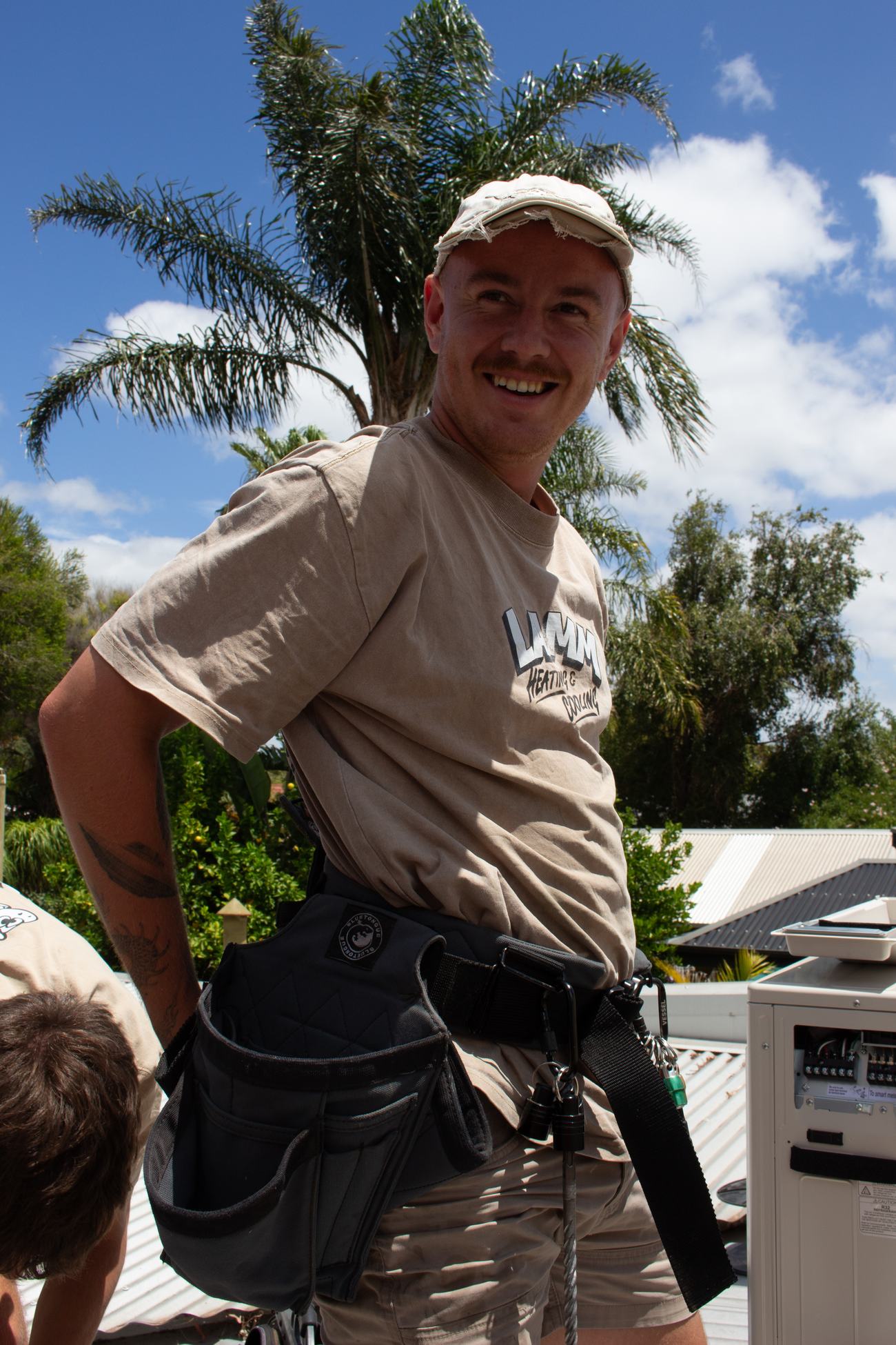 Lamm installers on a rooftop ducted job